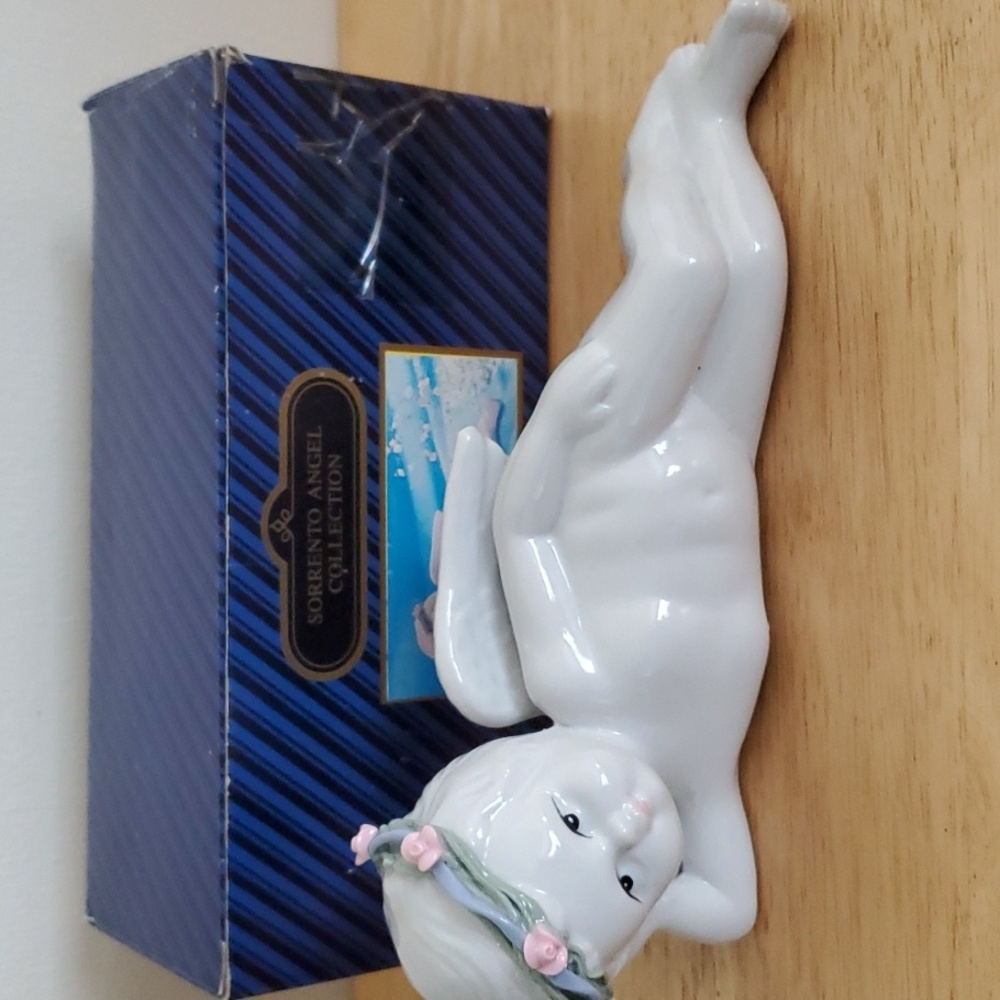 Sorrento Porcelain Laying Angel With Flower Ring